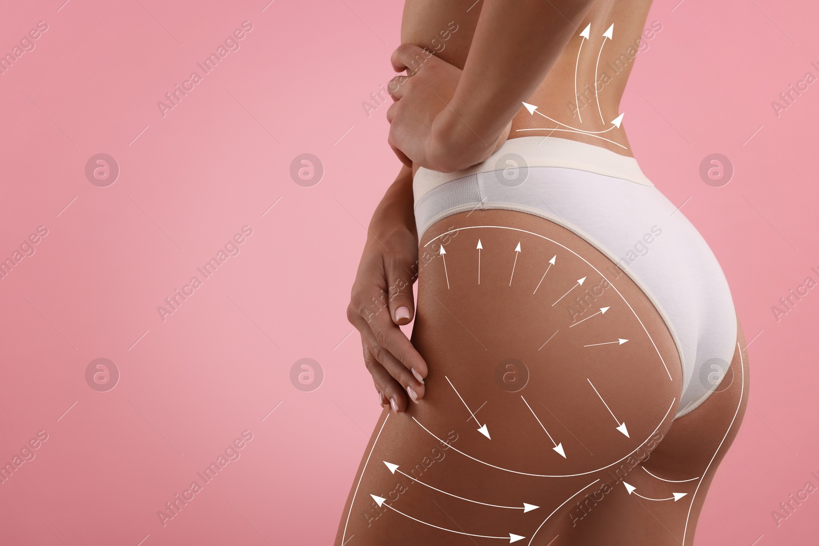 Liposuction. Woman with perfect figure against pink background, closeup. Markings on her body Image of Liposuction. Woman with perfect figure against pink background, closeup. Markings on her body