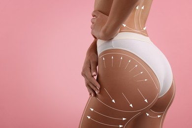 Image of Liposuction. Woman with perfect figure against pink background, closeup. Markings on her body
