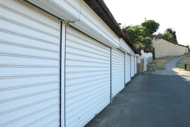 Photo of Many stalls closed with roller shutters outdoors