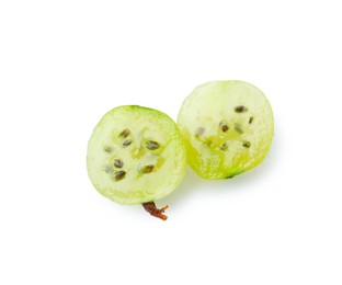 Photo of Halves of fresh ripe green gooseberry isolated on white, top view
