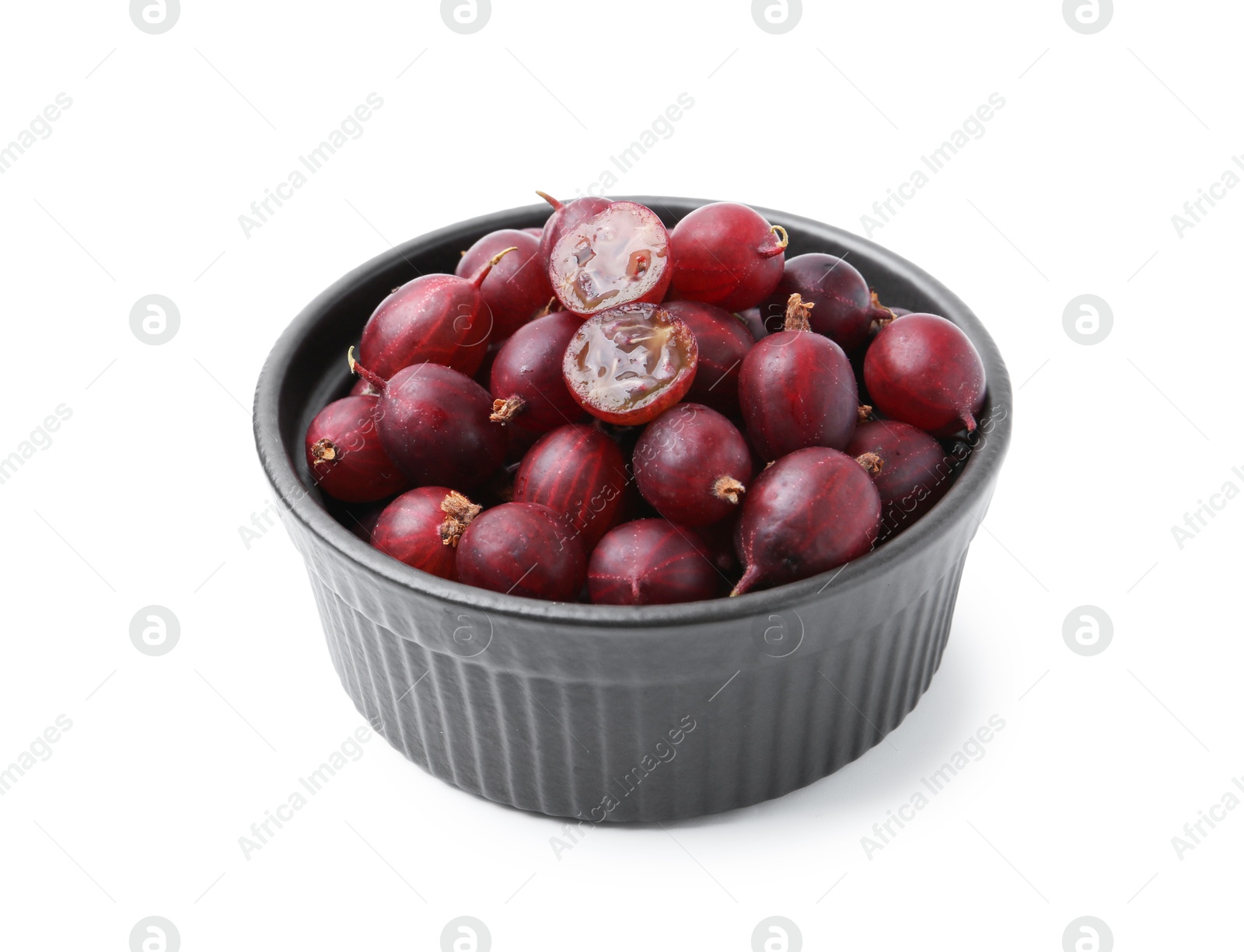 Fresh ripe red gooseberries in bowl isolated on white Photo of Fresh ripe red gooseberries in bowl isolated on white