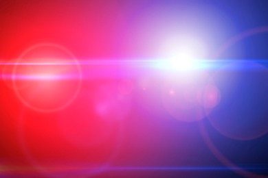 Image of Police red and blue lights, blurred view