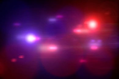 Image of Police red and blue lights, blurred view