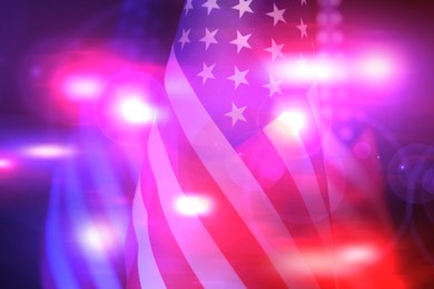 Image of Police red and blue lights, double exposure with flag of United States of America