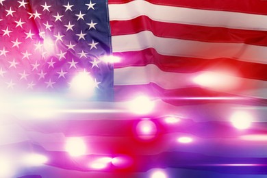 Image of Police red and blue lights, double exposure with flag of United States of America