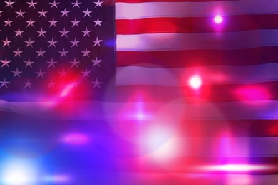 Image of Police red and blue lights, double exposure with flag of United States of America