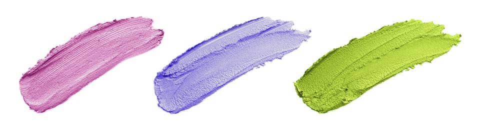 Image of Cream eye shadow samples isolated on white, set. Top view