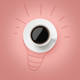 Image of Cup of coffee as part of drawn light bulb on pink background, top view. Good idea
