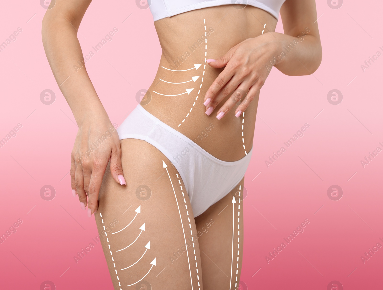 Liposuction. Woman with perfect figure against pink gradient background, closeup. Markings on her body Image of Liposuction. Woman with perfect figure against pink gradient background, closeup. Markings on her body