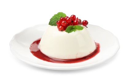 Photo of Delicious panna cotta with red currants, sauce and mint isolated on white