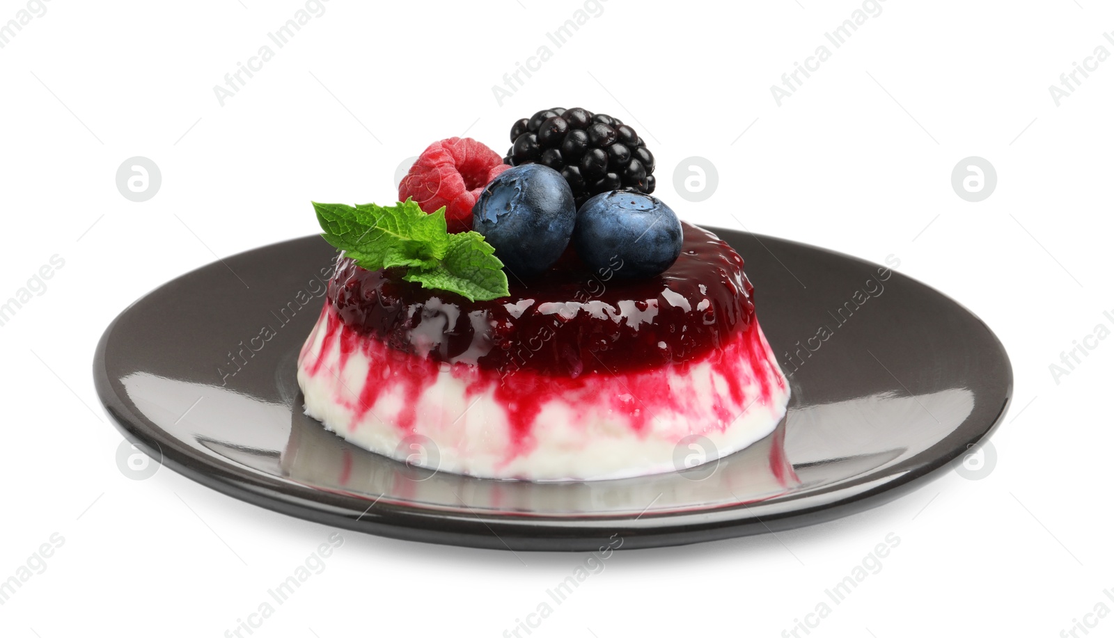 Photo of Delicious panna cotta with berries, jam and mint isolated on white