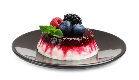Photo of Delicious panna cotta with berries, jam and mint isolated on white