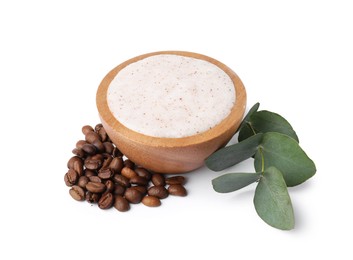 Photo of Natural body scrub in bowl, coffee beans and eucalyptus branch isolated on white