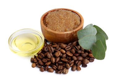 Photo of Natural body scrub in bowl, coffee beans, oil and eucalyptus branch isolated on white