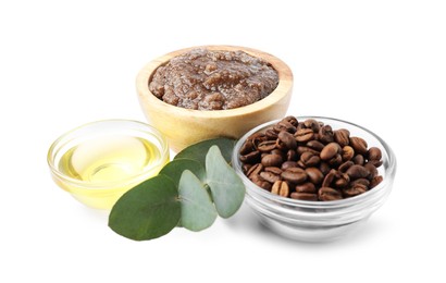 Photo of Natural body scrub, coffee beans, oil and eucalyptus branch isolated on white