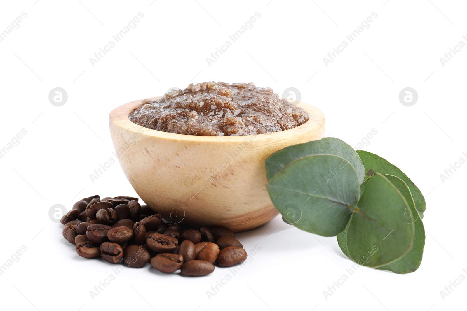 Natural body scrub in wooden bowl, coffee beans and eucalyptus branch isolated on white Photo of Natural body scrub in wooden bowl, coffee beans and eucalyptus branch isolated on white
