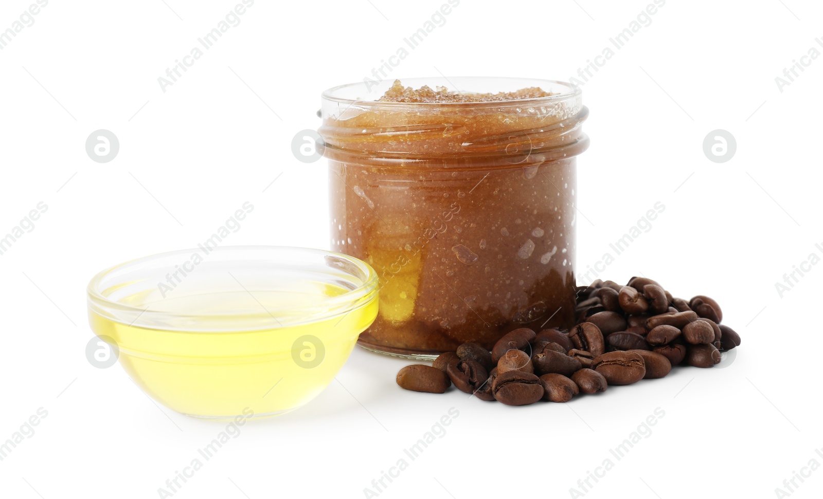 Natural body scrub in glass jar, coffee beans and oil isolated on white Photo of Natural body scrub in glass jar, coffee beans and oil isolated on white