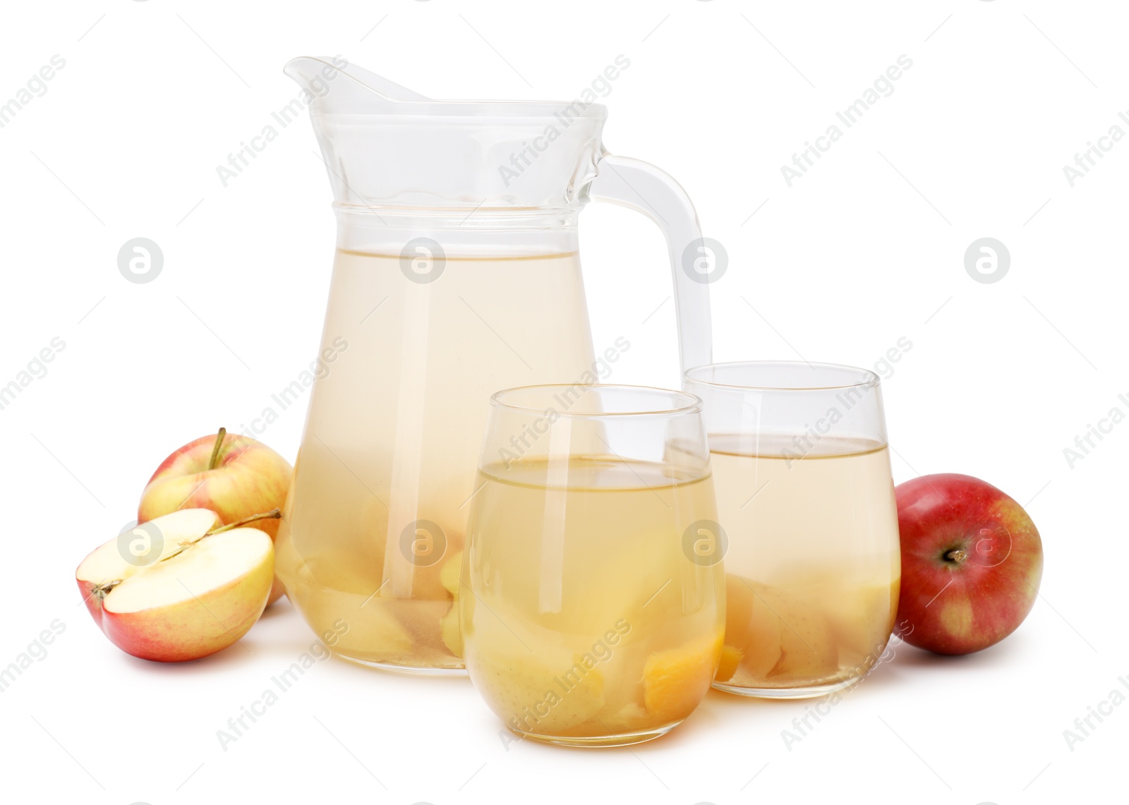 Photo of Tasty compot in glasses, jug and fresh apples isolated on white