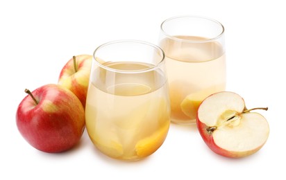 Photo of Tasty compot in glasses and fresh apples isolated on white