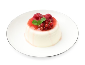 Photo of Delicious panna cotta with berries, sauce and mint isolated on white