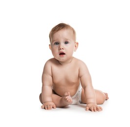 Photo of Cute little baby sitting on white background