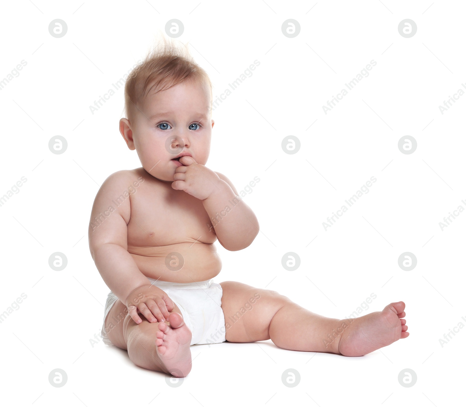 Cute little baby sitting on white background Photo of Cute little baby sitting on white background