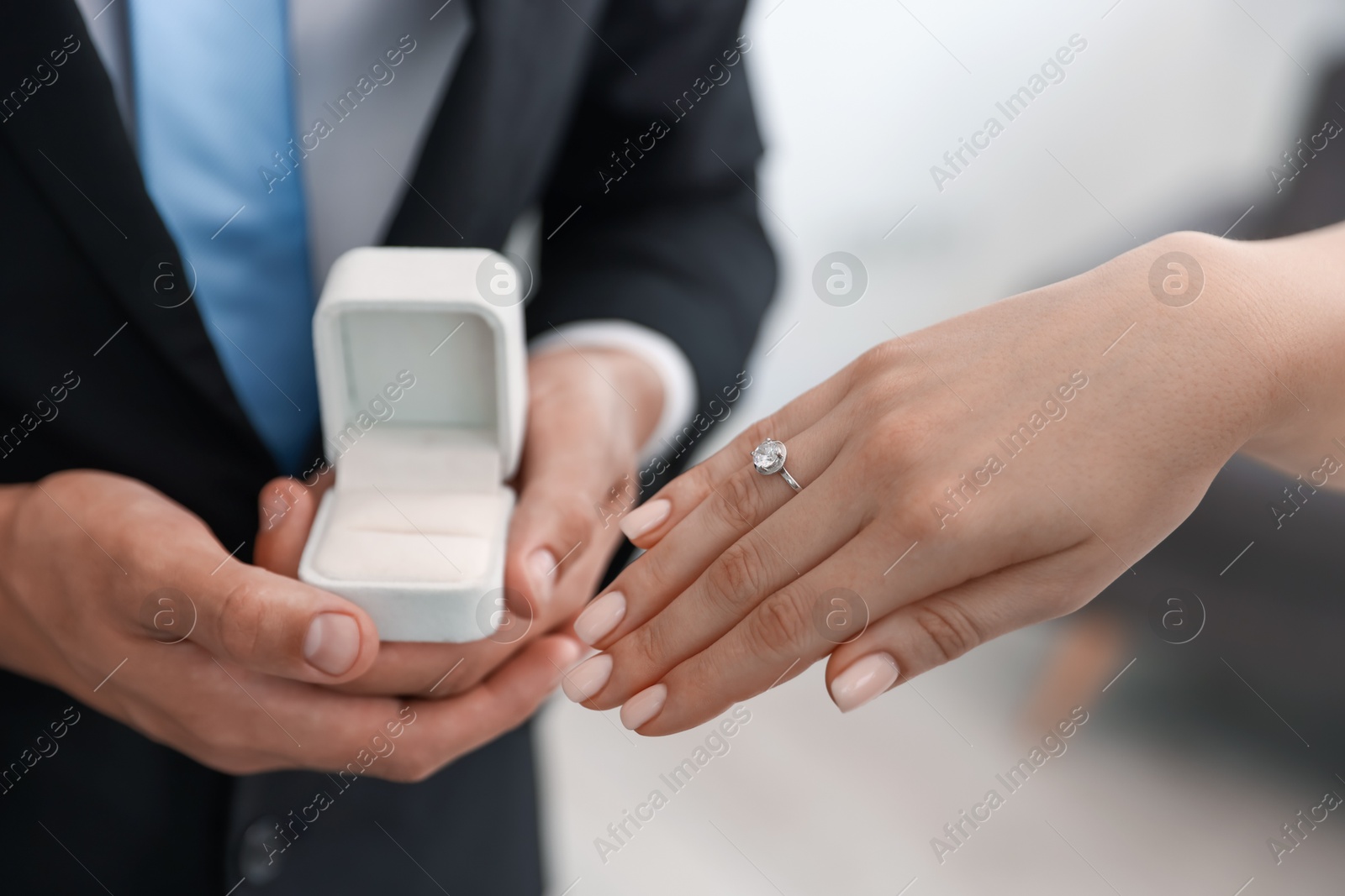 Making proposal. Woman with engagement ring and her fiance indoors, closeup Photo of Making proposal. Woman with engagement ring and her fiance indoors, closeup