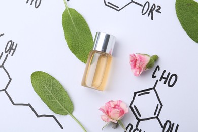 Photo of Bottle of cosmetic product, sage and roses on paper with chemical formulas, flat lay