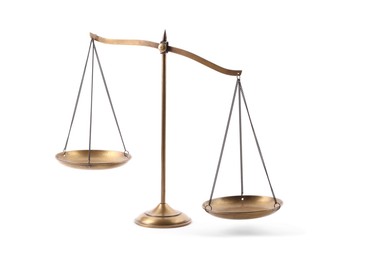 Photo of Golden scales of justice isolated on white