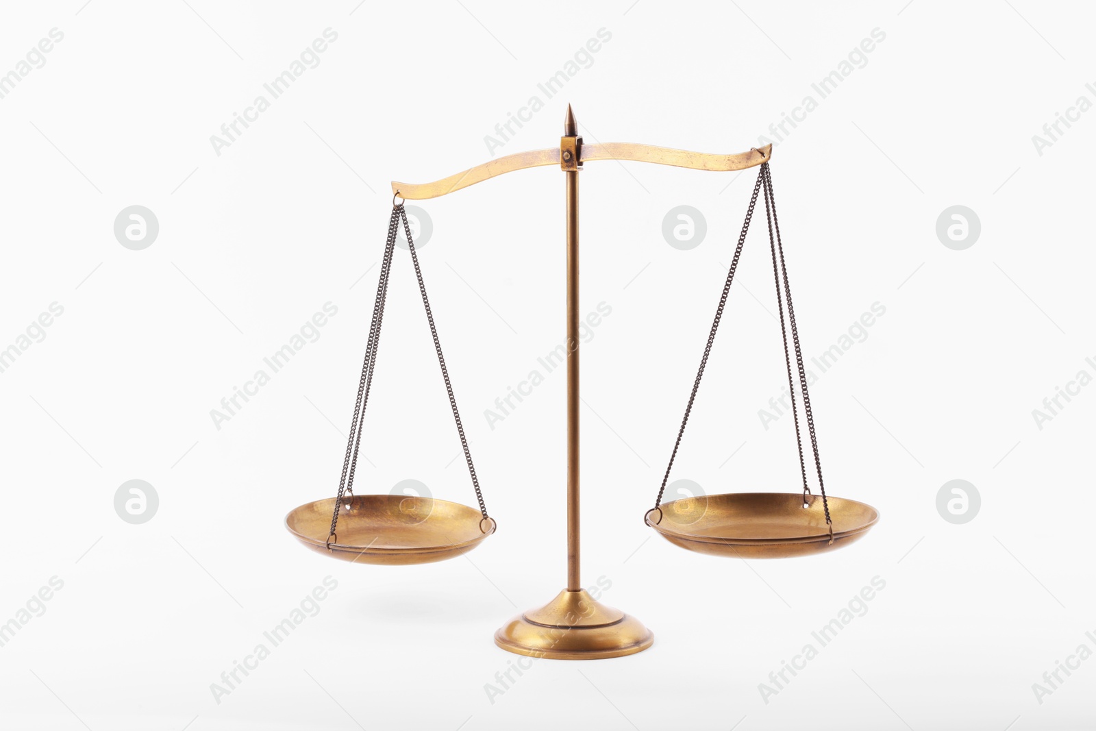 Golden scales of justice isolated on white Photo of Golden scales of justice isolated on white
