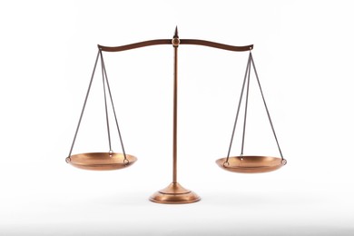Photo of Golden scales of justice isolated on white