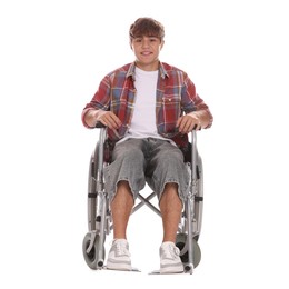 Photo of Smiling teenage boy in wheelchair on white background