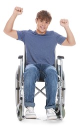 Photo of Smiling teenage boy in wheelchair on white background