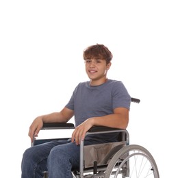 Photo of Smiling teenage boy in wheelchair on white background