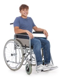 Photo of Smiling teenage boy in wheelchair on white background