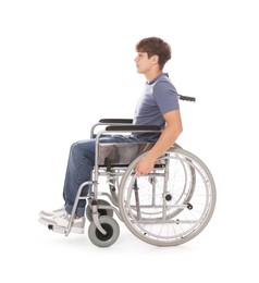 Photo of Teenage boy in wheelchair on white background