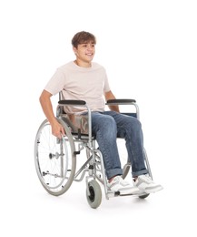 Photo of Smiling teenage boy in wheelchair on white background