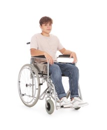 Photo of Teenage boy in wheelchair on white background