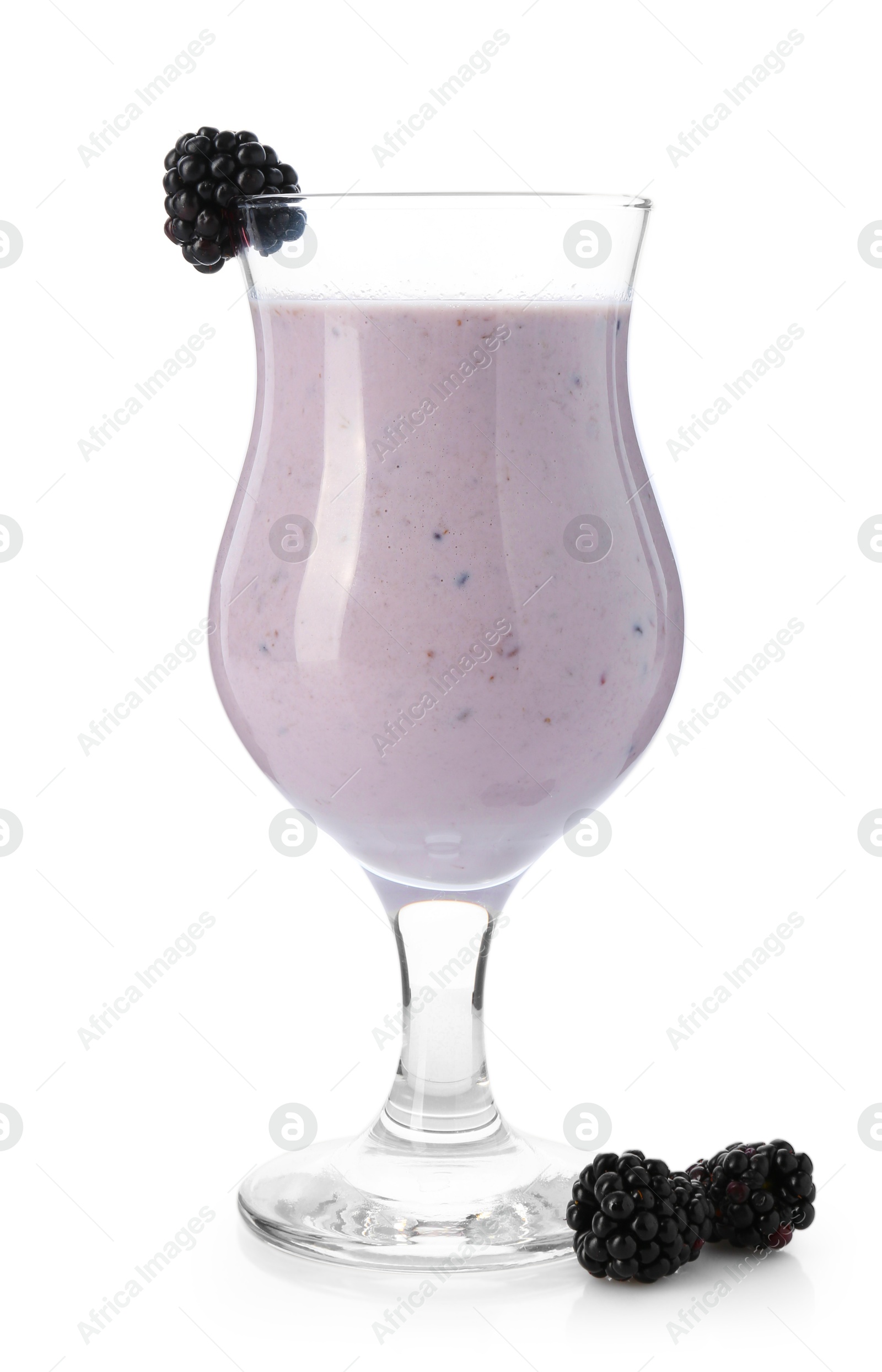 Photo of Tasty blackberry milkshake in glass and berries isolated on white