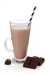 Photo of Tasty milkshake in glass and pieces of chocolate isolated on white