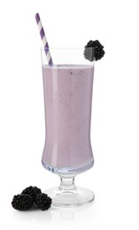 Photo of Tasty blackberry milkshake in glass and berries isolated on white