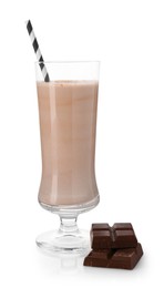 Photo of Tasty milkshake in glass and pieces of chocolate isolated on white
