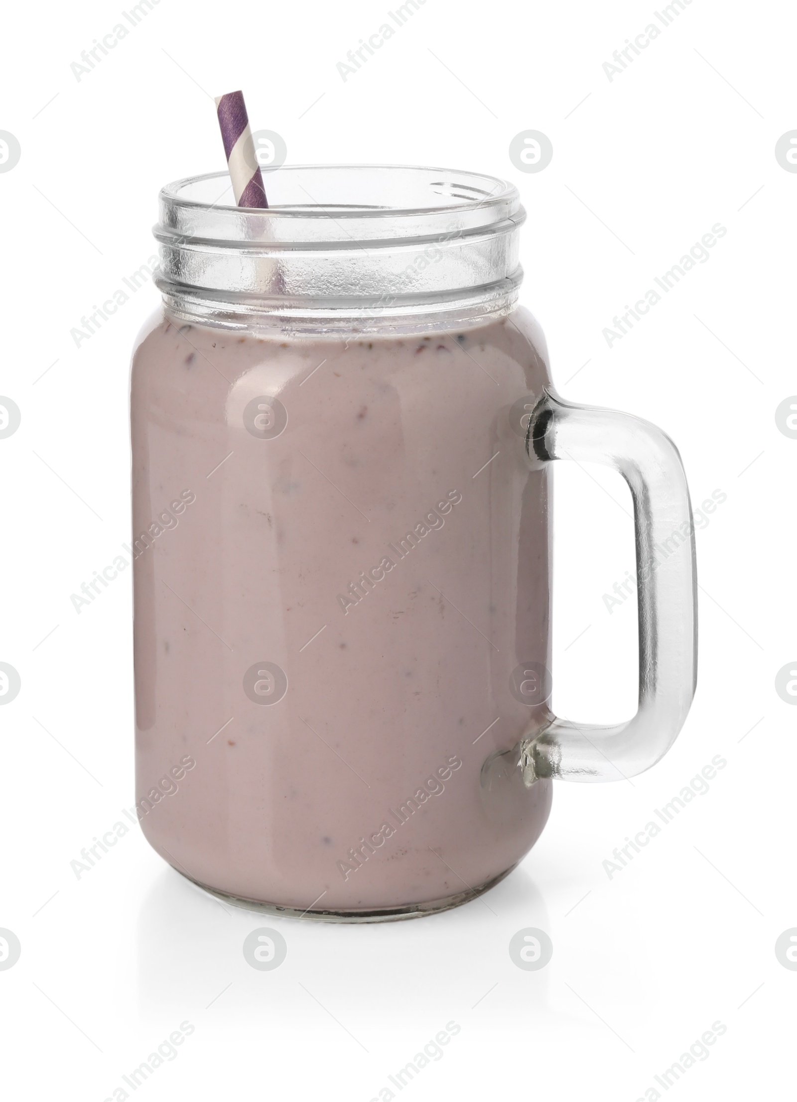 Photo of Tasty blackberry milkshake in mason jar isolated on white