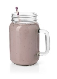 Photo of Tasty blackberry milkshake in mason jar isolated on white