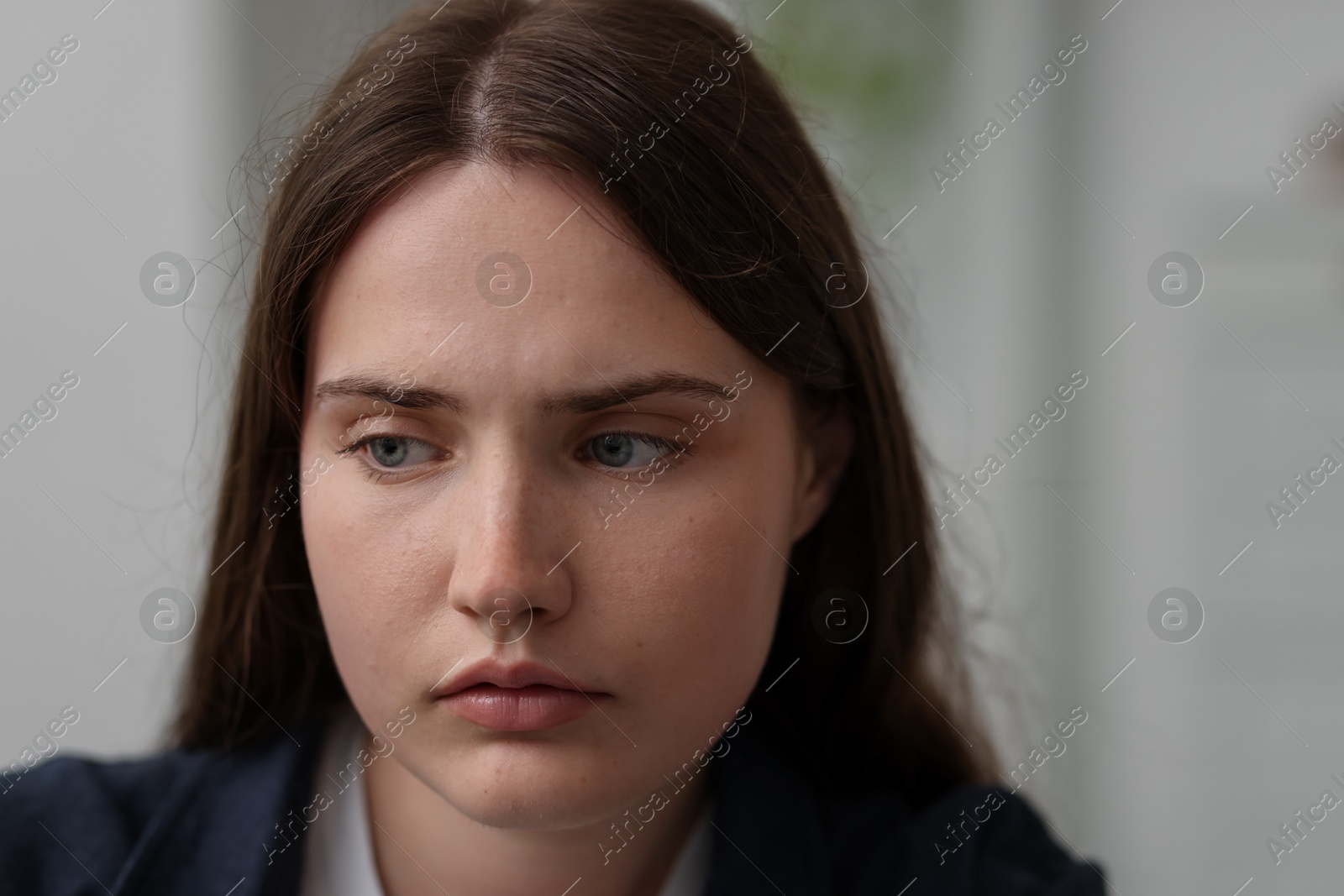 Photo of Sad young woman at home. Depression concept