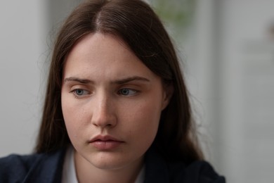 Photo of Sad young woman at home. Depression concept