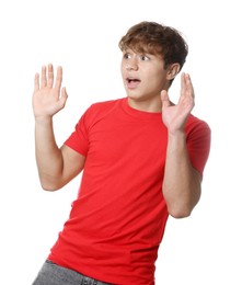 Photo of Teenage boy suffering from panic attack on white background