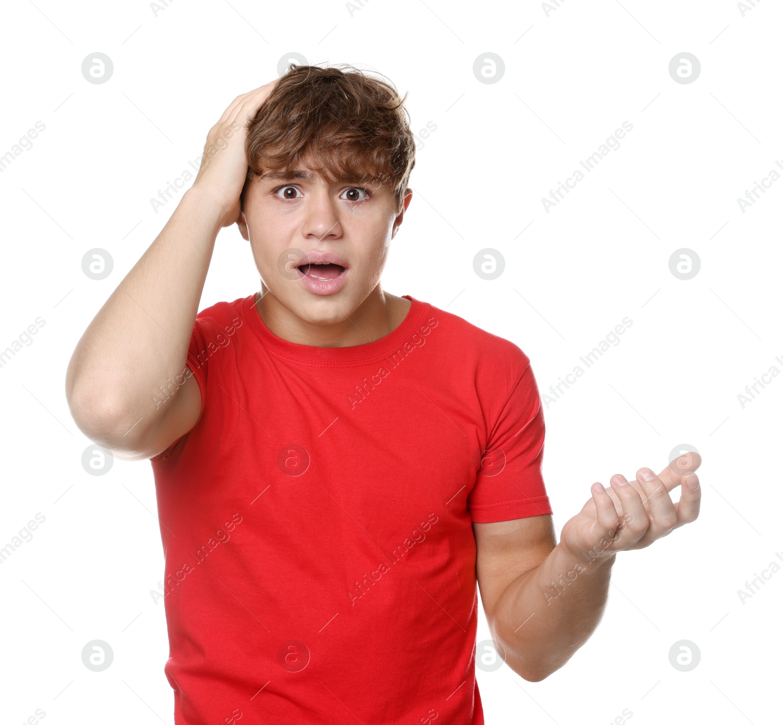 Photo of Teenage boy suffering from panic attack on white background