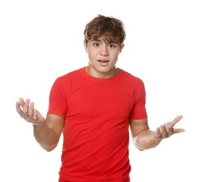 Photo of Teenage boy suffering from panic attack on white background