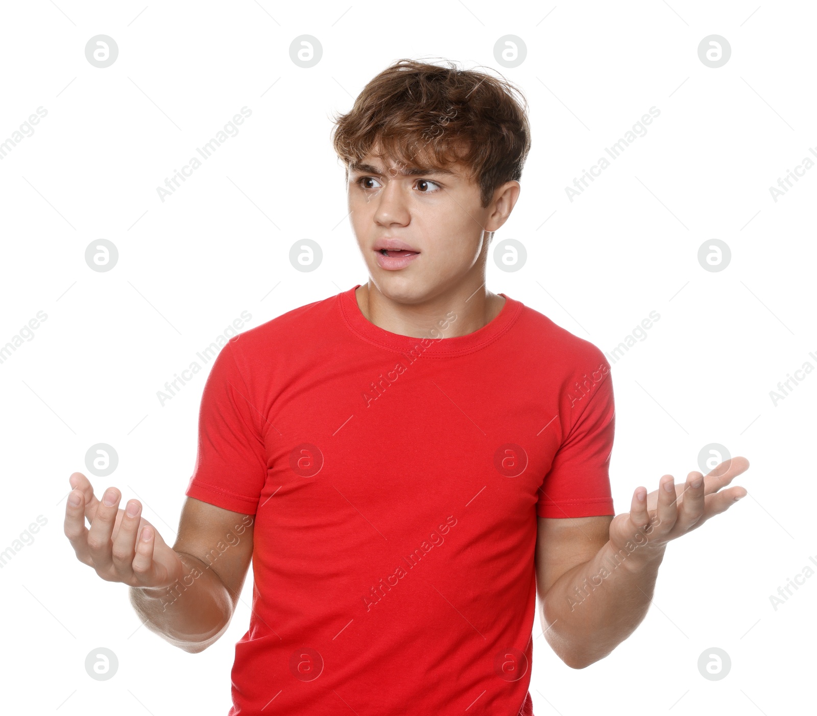 Teenage boy suffering from panic attack on white background Photo of Teenage boy suffering from panic attack on white background